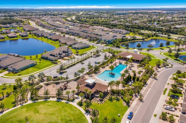 drone / aerial view with a water view