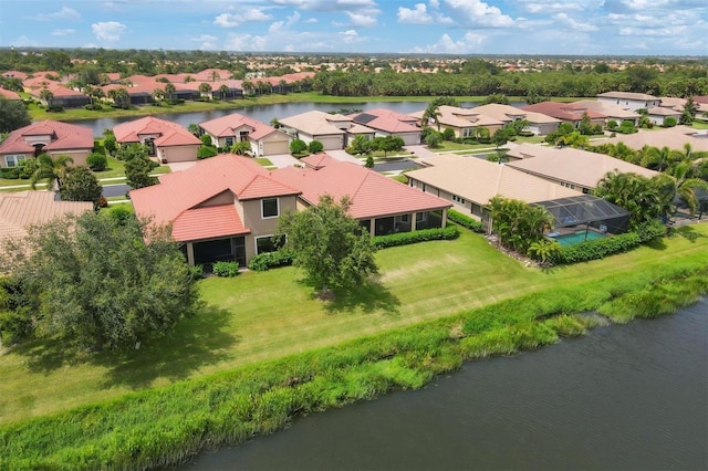 drone / aerial view with a water view