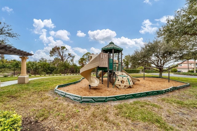 view of playground featuring a lawn