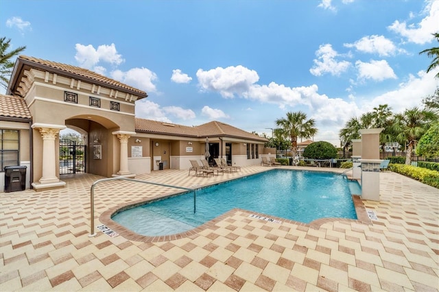 view of pool featuring a patio