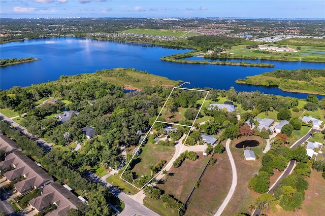 bird's eye view with a water view