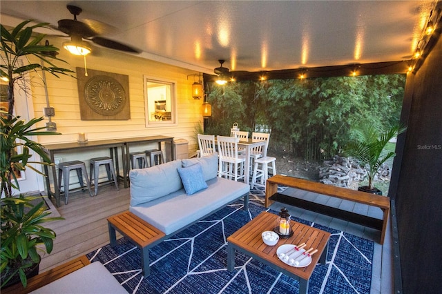 exterior space featuring dark hardwood / wood-style floors and ceiling fan