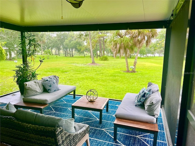 view of patio featuring an outdoor living space and ceiling fan