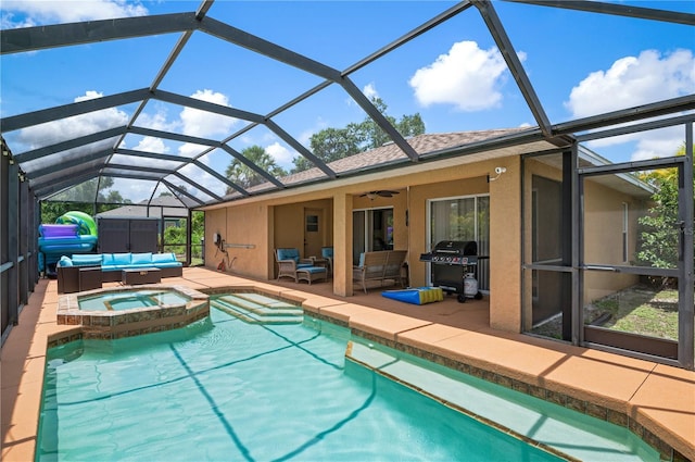 view of swimming pool featuring an outdoor hangout area, a patio, grilling area, glass enclosure, and an in ground hot tub