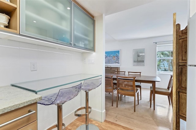 dining room featuring light wood-type flooring