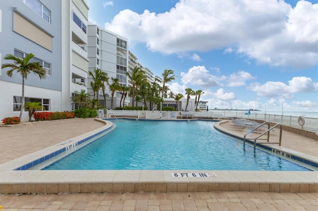 view of pool with a patio