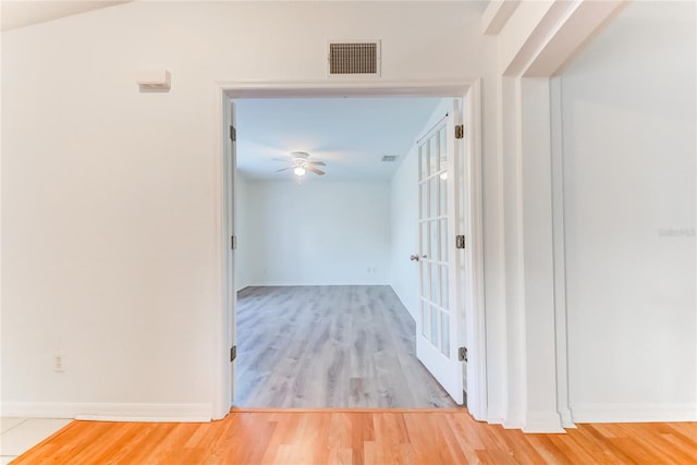 hallway featuring hardwood / wood-style floors