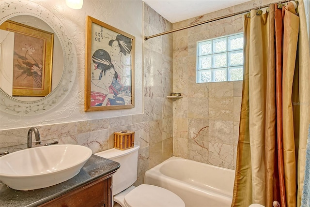 full bathroom with vanity, toilet, and shower / bathtub combination with curtain