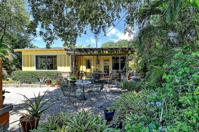 rear view of house with a patio area