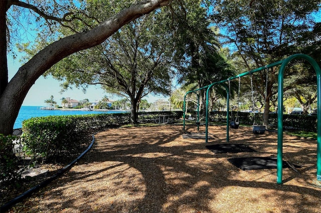 view of playground featuring a water view