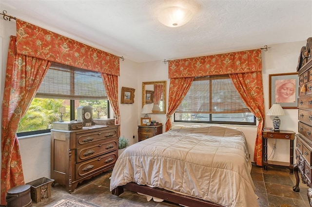 bedroom with a textured ceiling