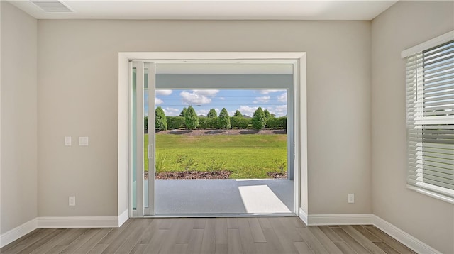 doorway to outside with plenty of natural light