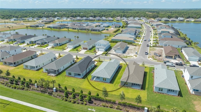 bird's eye view with a water view