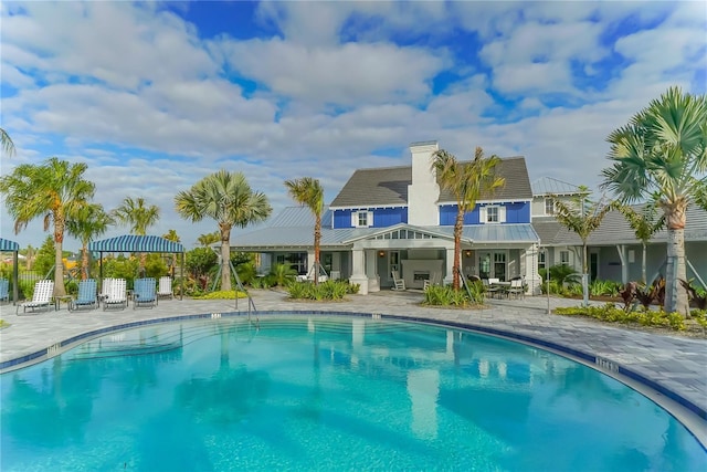 view of pool featuring a patio area