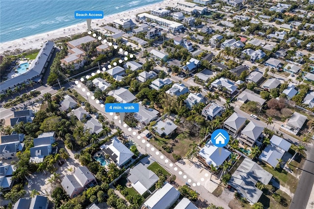 aerial view with a beach view and a water view