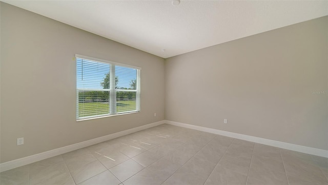 view of tiled empty room