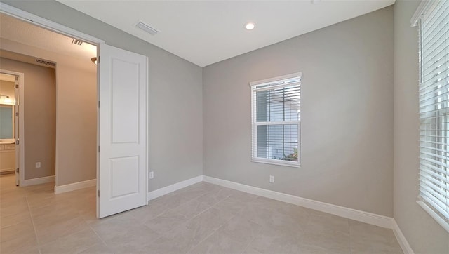 view of tiled empty room