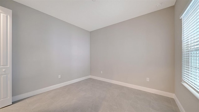 view of tiled empty room