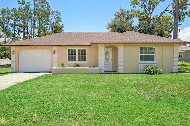 single story home with a front yard and a garage