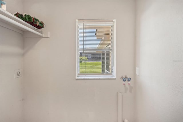 laundry room featuring electric dryer hookup