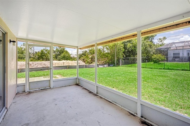 unfurnished sunroom with plenty of natural light