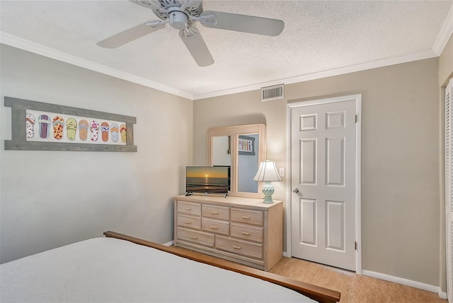 carpeted bedroom featuring crown molding, a textured ceiling, and ceiling fan