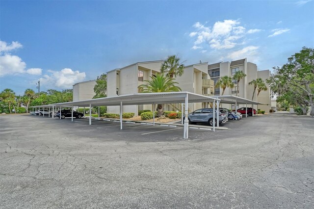 view of car parking featuring a carport