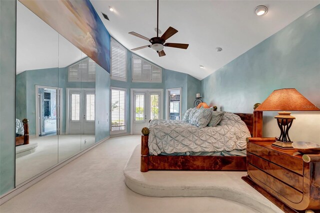 carpeted bedroom featuring access to exterior, ceiling fan, and high vaulted ceiling