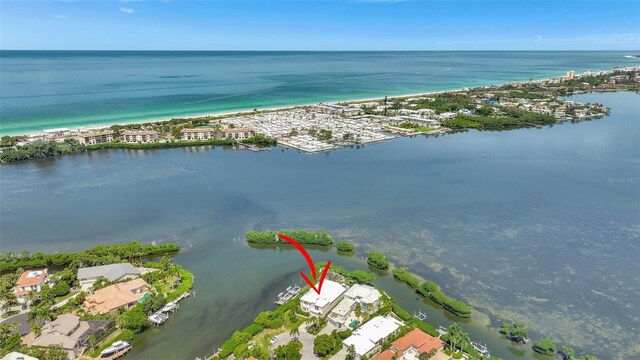 drone / aerial view featuring a water view