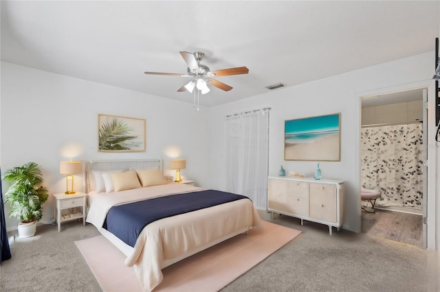 carpeted bedroom with ceiling fan