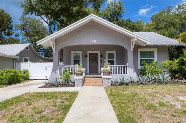 bungalow-style home featuring covered porch