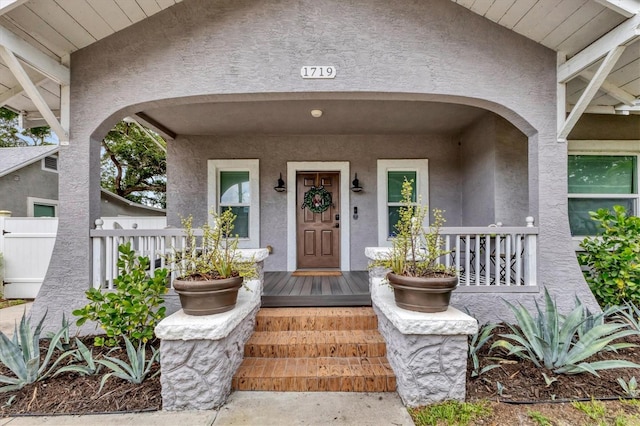 entrance to property with a porch