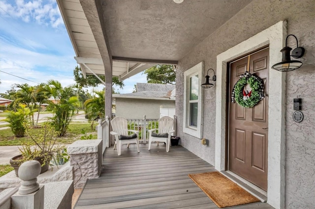 deck featuring a porch