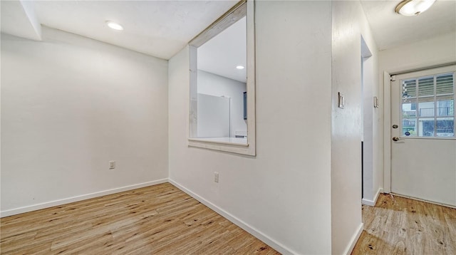 hallway featuring light hardwood / wood-style floors