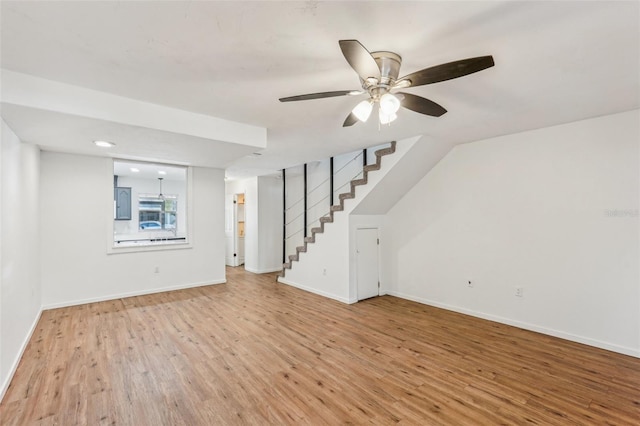 interior space featuring ceiling fan and light wood-type flooring