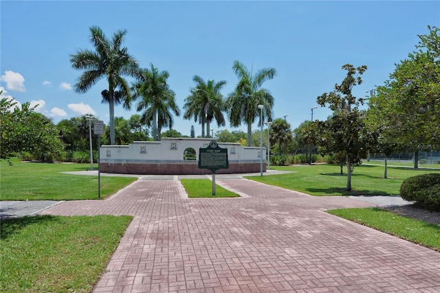 surrounding community featuring a yard