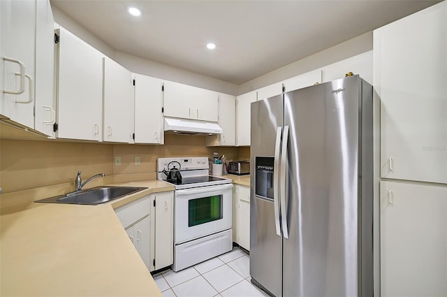 kitchen with white cabinets, stainless steel fridge with ice dispenser, and electric range