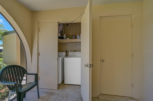 washroom with washer and clothes dryer