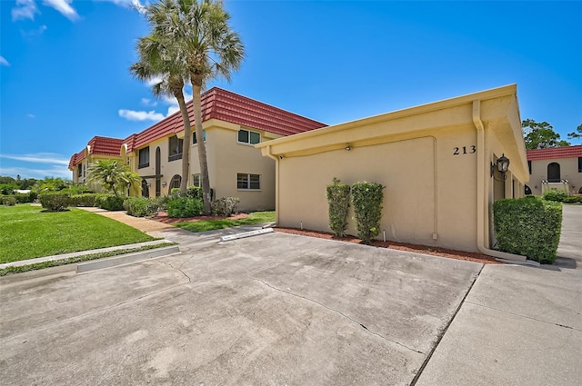 exterior space featuring a lawn