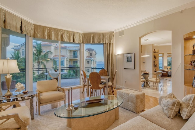 tiled living room with ornamental molding