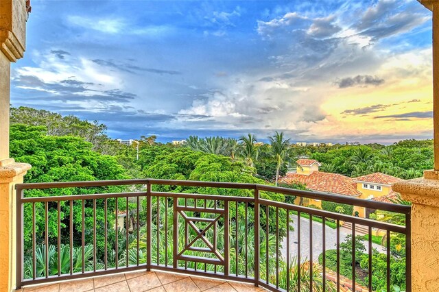 view of balcony at dusk