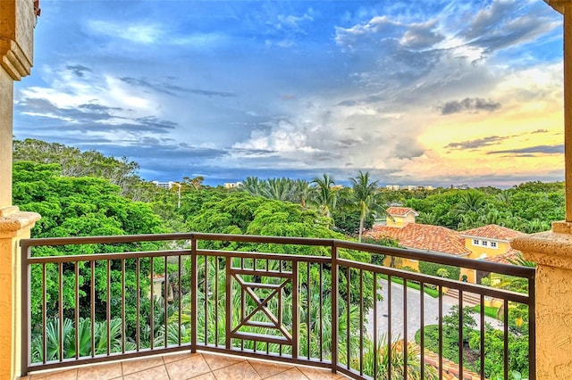 view of balcony at dusk