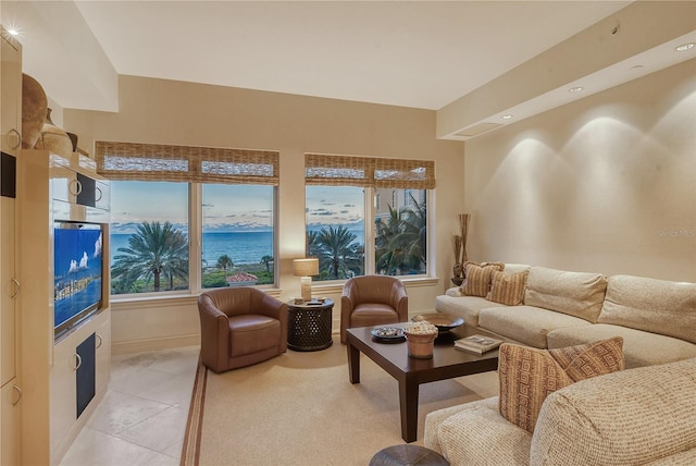 living room with light tile patterned flooring