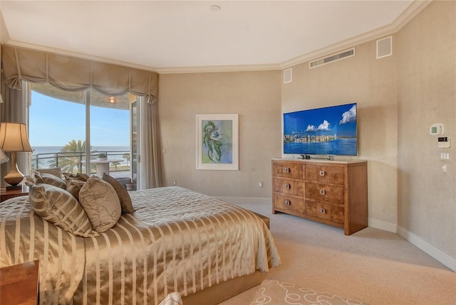 bedroom with crown molding, access to outside, light colored carpet, and a water view