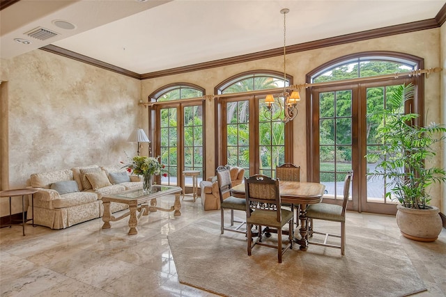 tiled dining room with a notable chandelier, crown molding, and a healthy amount of sunlight