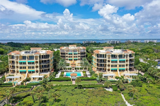 birds eye view of property featuring a water view