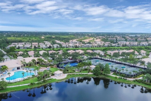 birds eye view of property featuring a water view