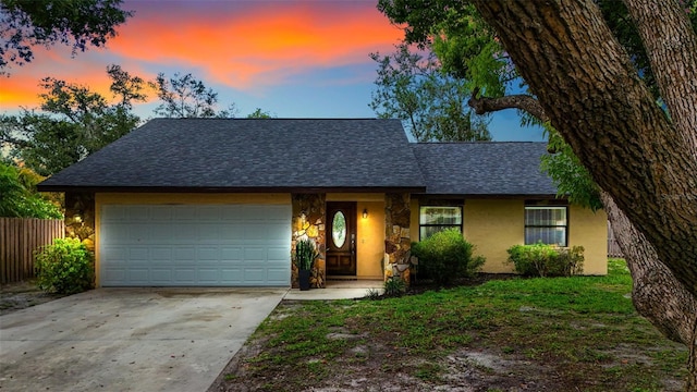 ranch-style house with a garage