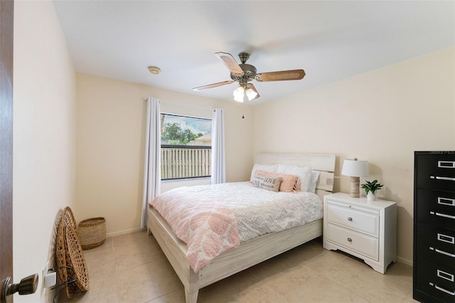 bedroom featuring ceiling fan and light tile patterned floors