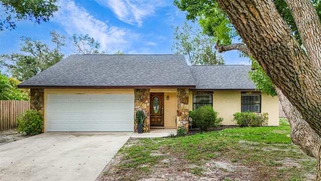 single story home featuring a garage